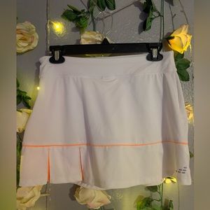 Orange and white tennis skirt